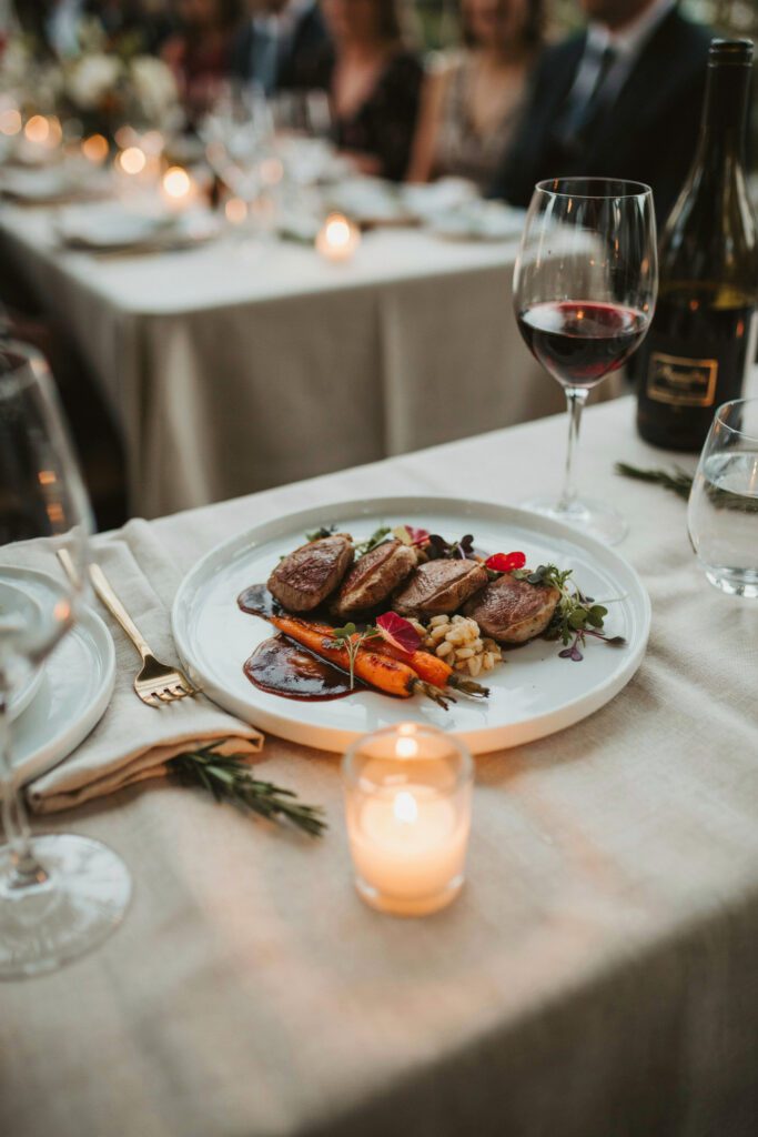  A beautifully plated gourmet meal at an intimate wedding reception — evidence that fewer guests means better food for everyone