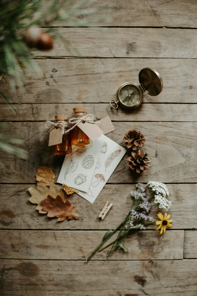 Flat lay of printed nature scavenger hunt favor tags for wedding guests, tied with twine